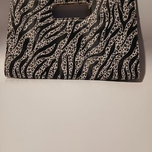 Zebra Print Clutch. Magnetic Snap Closures.